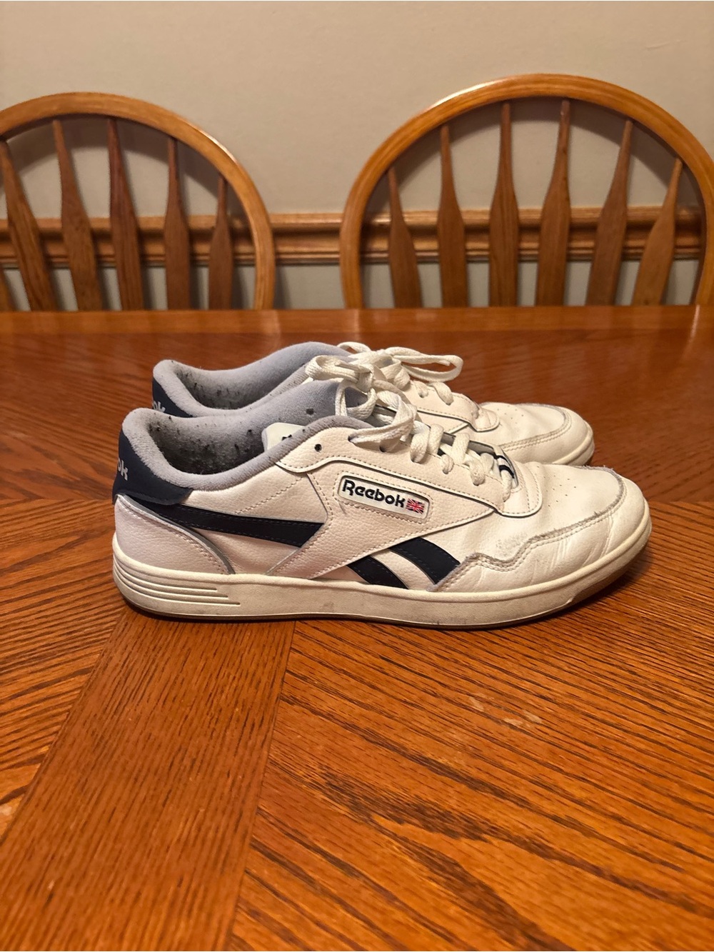 Reebok White Sneakers with Navy Detailing